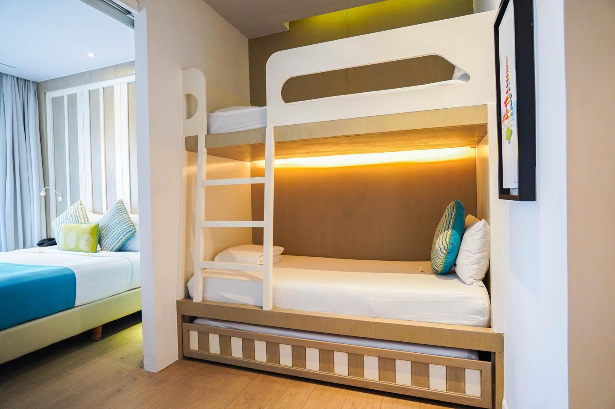 Grand Mirage Resort & Thalasso Bali Nusa Dua (Bali) Exterior foto Bunk beds in a hotel room